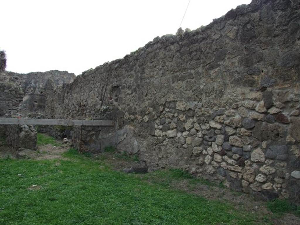 VII.12.13 Pompeii.   December 2007.  West wall of shop and corridor to bakery area.