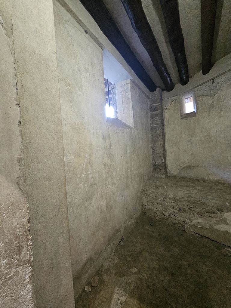 VII.12.18 Pompeii. November 2024. 
Looking south along east wall with graffiti. Photo courtesy of Annette Haug.
