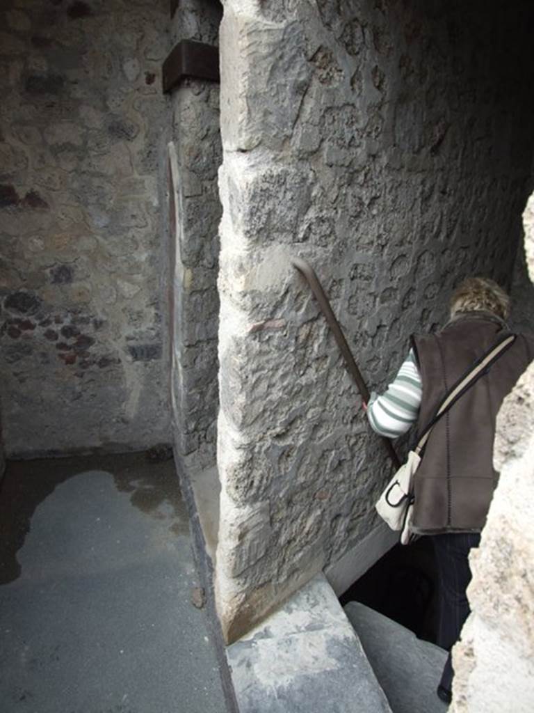 VII.12.20  Pompeii.  March 2009.  West end of corridor, with staircase down to lower floor, and door to Room 5.