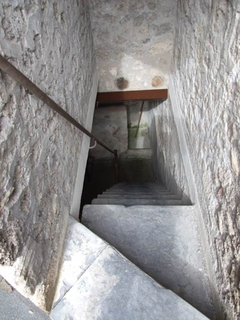 VII.12.20  Pompeii.  March 2009. Staircase to lower floor.