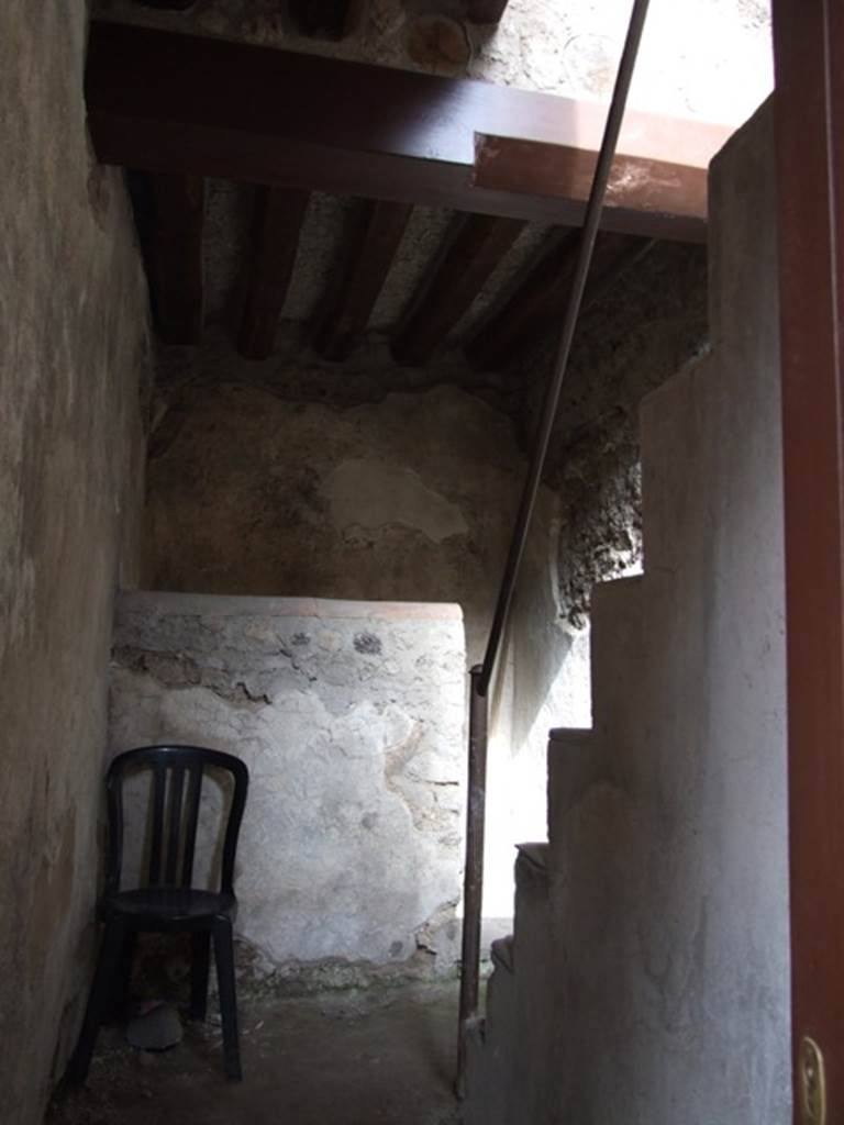 VII.12.20  Pompeii.  March 2009. Entrance corridor, leading to latrine and staircase, originally made of wood.  See Pappalardo, U., 2001. La Descrizione di Pompei per Giuseppe Fiorelli (1875). Napoli: Massa Editore. (p.112)
