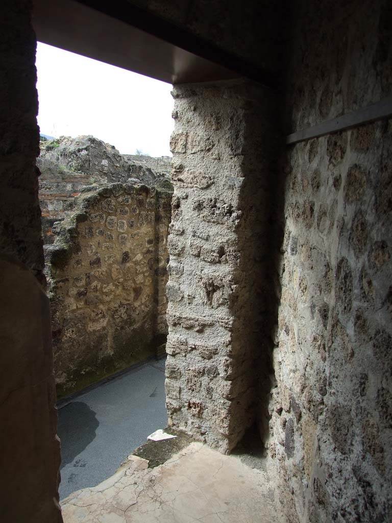 VII.12.20 Pompeii. March 2009. Doorway from room 2 onto outer corridor.