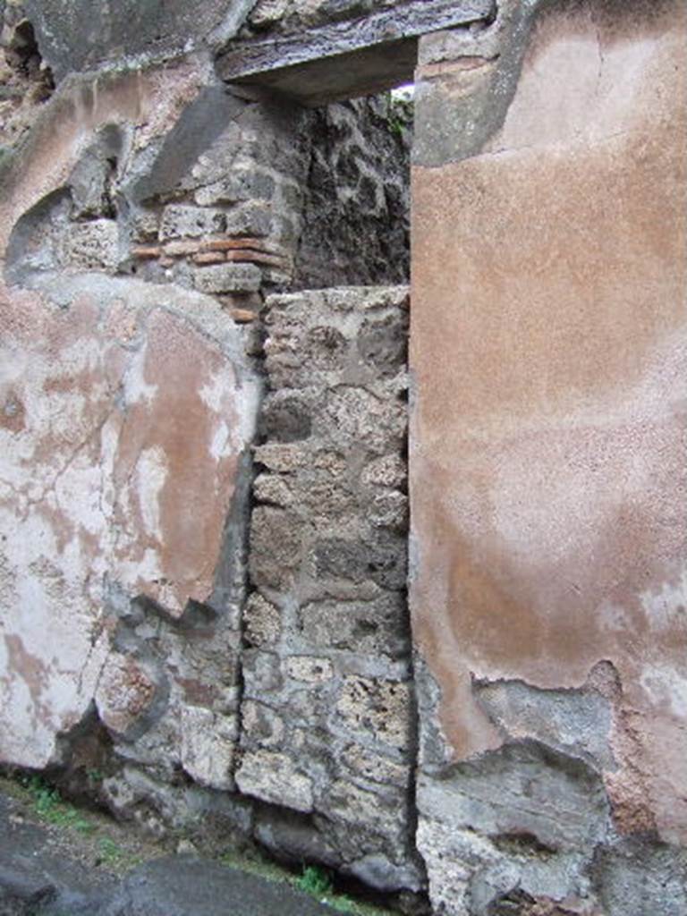 VII.12.22 Pompeii.  Entrance to workshop with steps to upper floor.  December 2005. Blocked entrance.