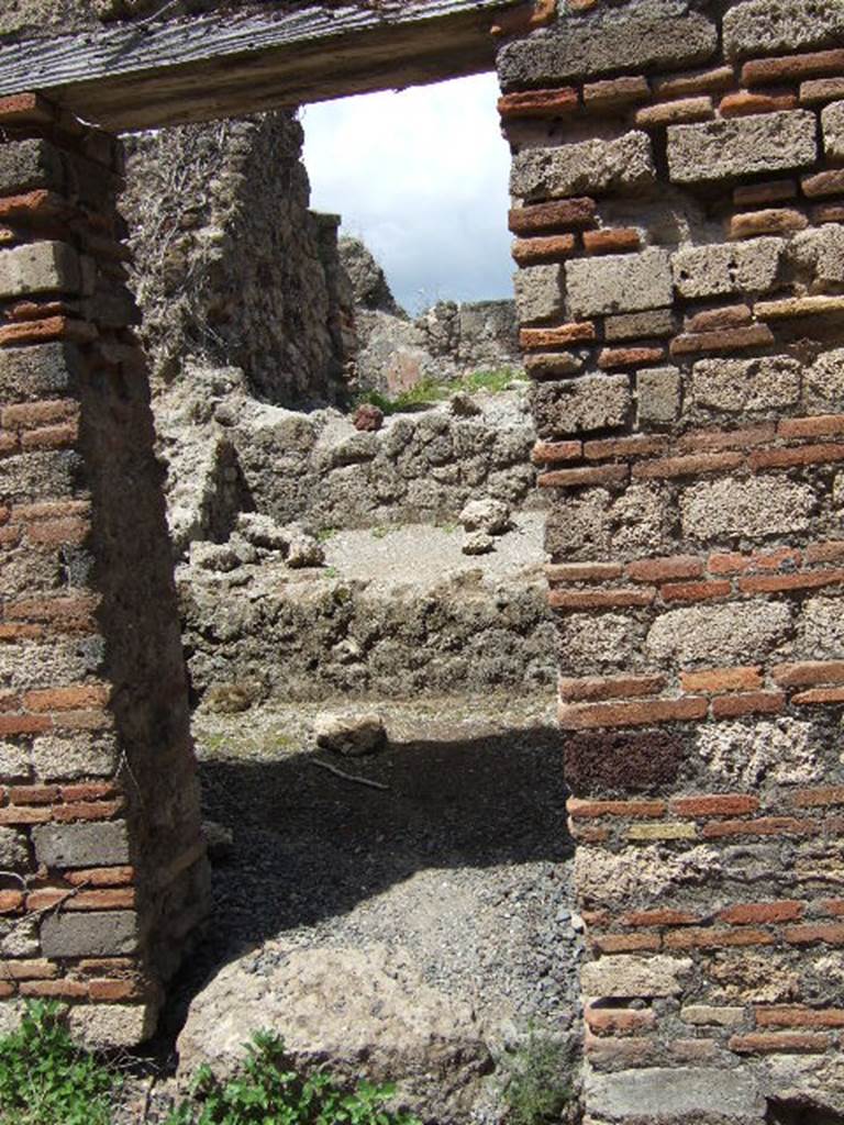 VII.12.33 Cella meretricia under 
steps to upper floor from VII.12.32
