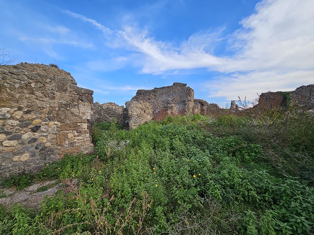 VII.12.35 Pompeii. November 2024. Looking east along rooms on north side of room (a). Photo courtesy of Annette Haug.