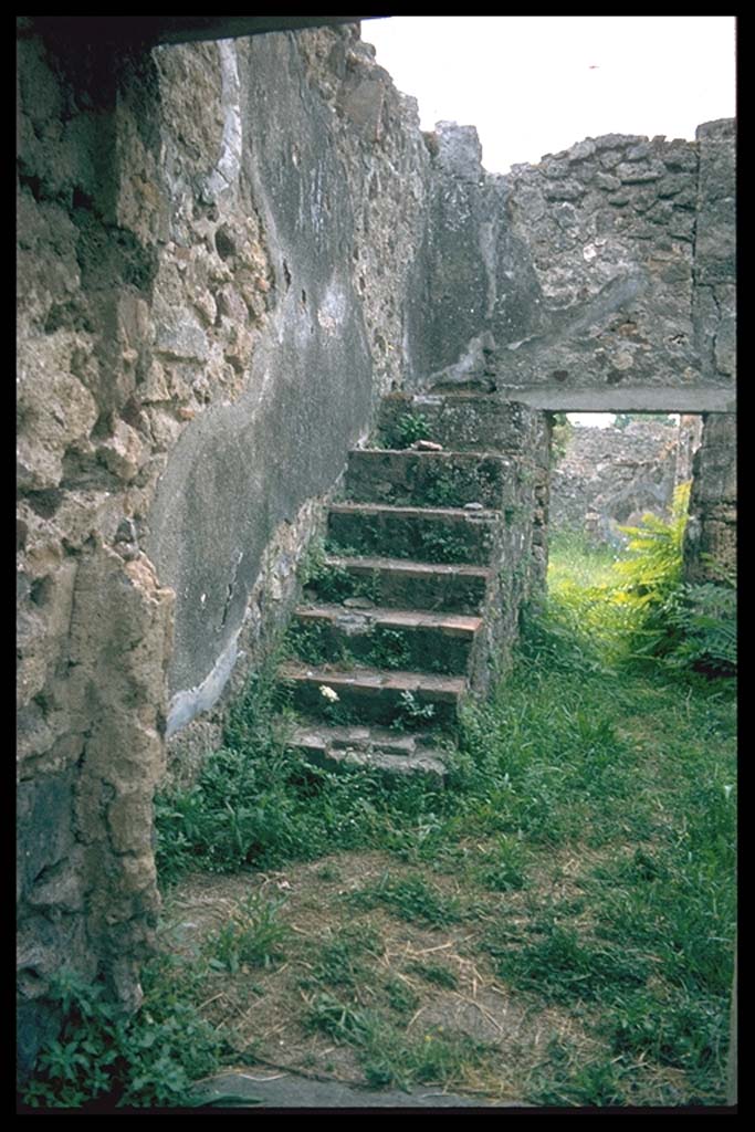 VII.13.8 Pompeii. Steps to upper floor.
Photographed 1970-79 by Günther Einhorn, picture courtesy of his son Ralf Einhorn.
