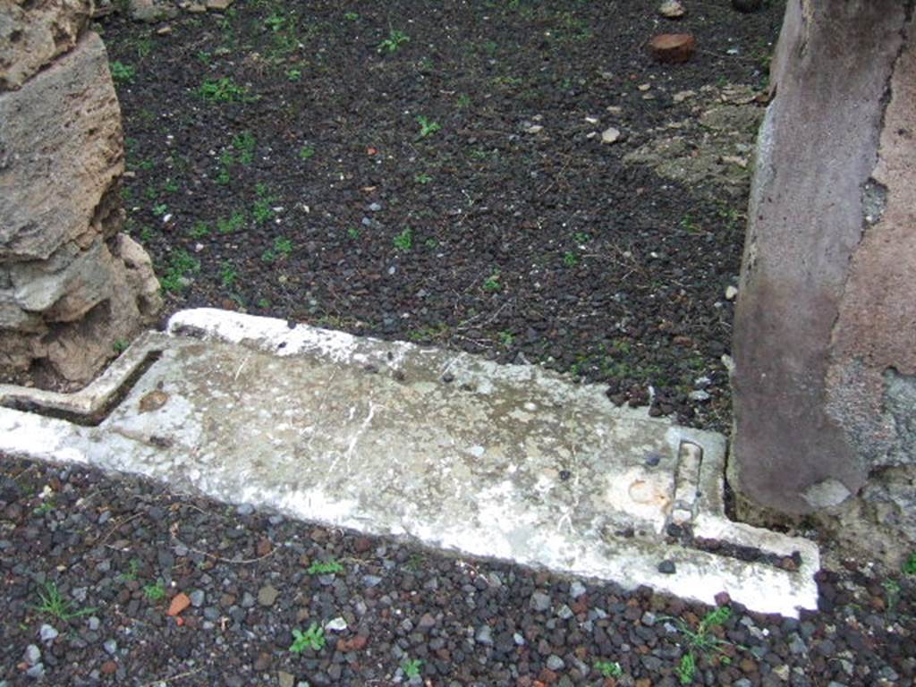VII.13.8 Pompeii. December 2005.  Marble threshold or sill to cubiculum on east of atrium.