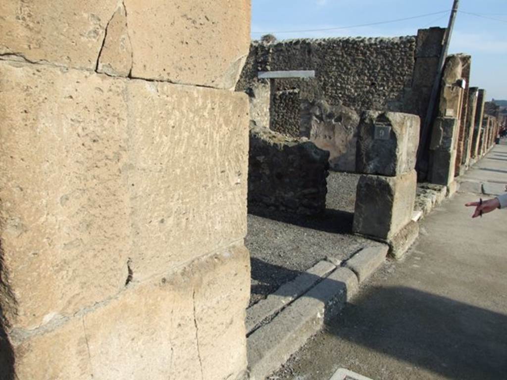 VII.13.9 Pompeii. December 2007. Looking east to entrance doorway on Via dell�Abbondanza.