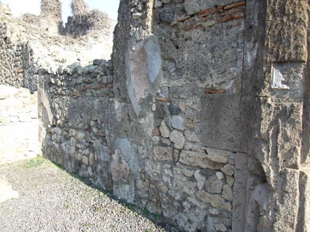 VII.14.1 Pompeii. December 2007. East wall of shop.
