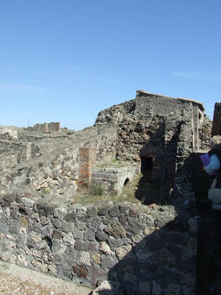 VII.15.2 Pompeii. March 2009. Looking east across kitchen.