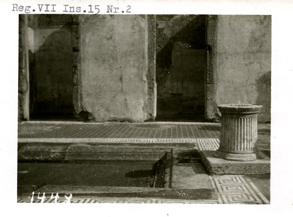 VII.15.2 Pompeii. Pre-1937-39.
Looking east towards two doorways (cubiculum g, on left, and cubiculum f, on right) on east side of atrium.
Photo courtesy of American Academy in Rome, Photographic Archive. Warsher collection no. 1448.