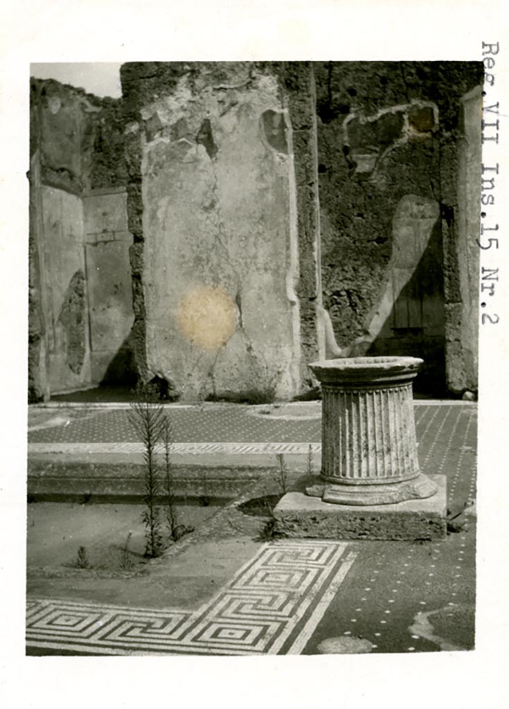 VII.15.2 Pompeii. Pre-1937-39.
Looking east towards two doorways (cubiculum g, on left, and cubiculum f, on right) on east side of atrium.
Remains of panted decoration are visible.
Photo courtesy of American Academy in Rome, Photographic Archive. Warsher collection no. 444.