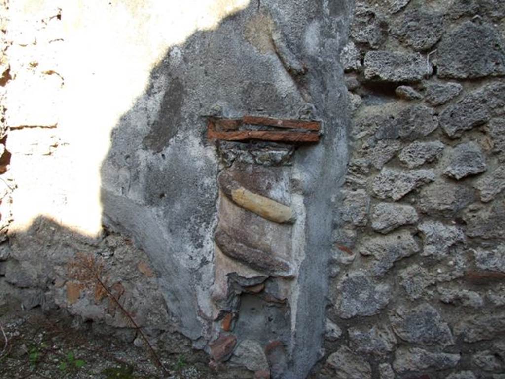 VII.15.13 Pompeii. December 2007. Lararium on east wall of kitchen area.