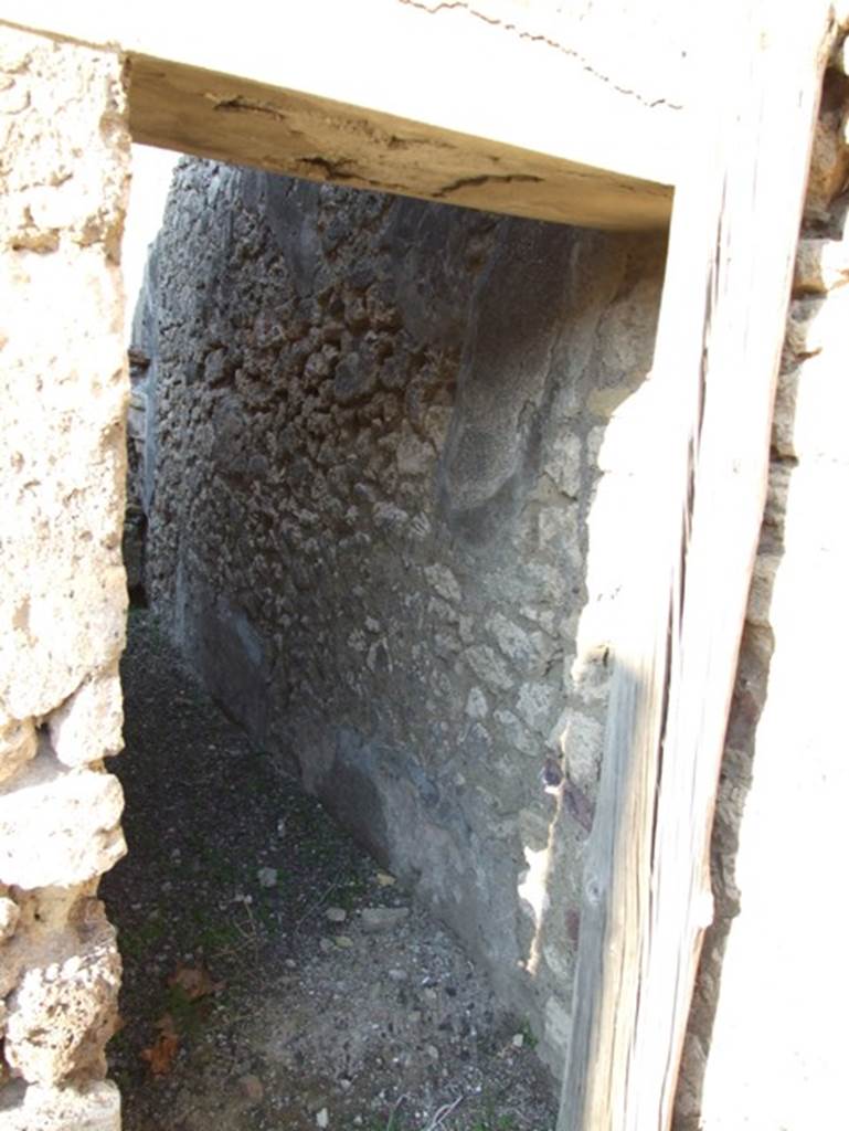 VII.15.13 Pompeii. December 2007. Corridor looking north towards kitchen area from atrium.
