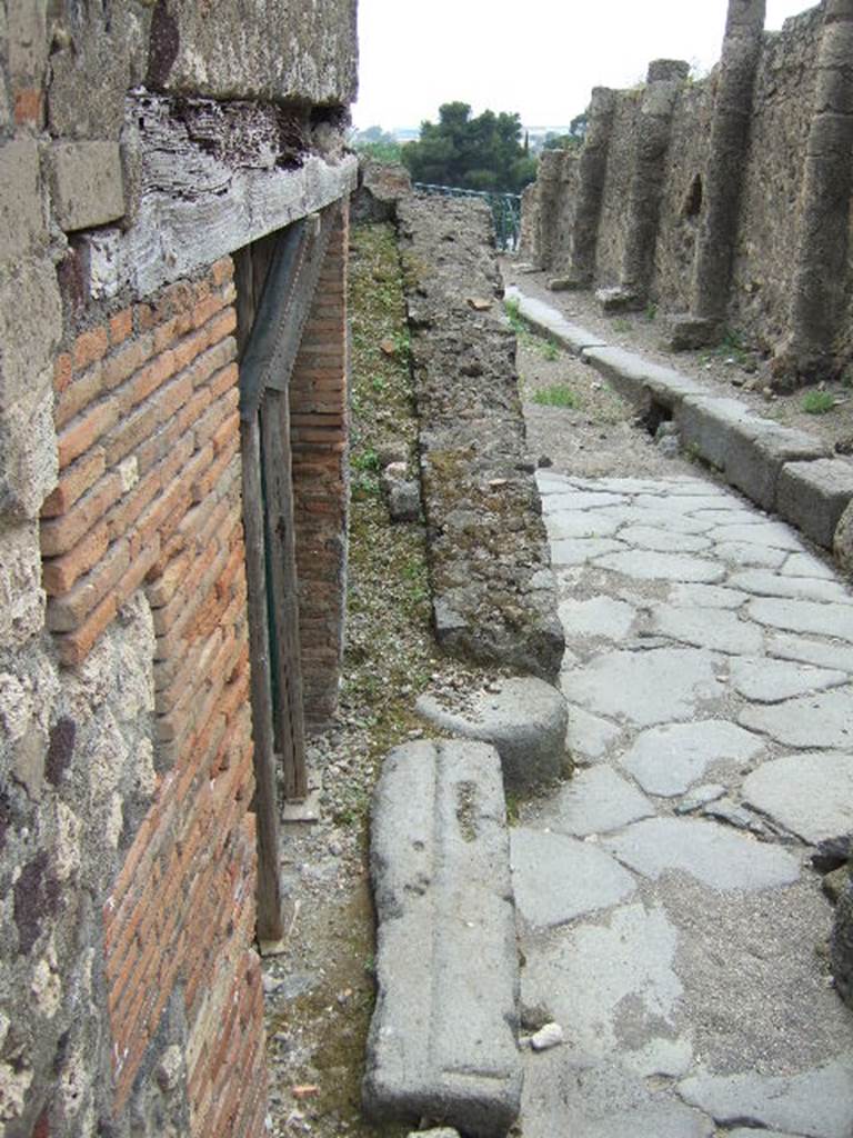 Ramp outside VII.15.16. May 2006.
This leads to a walled-up doorway that once led to the upper storey of the house at VII.15.2.
