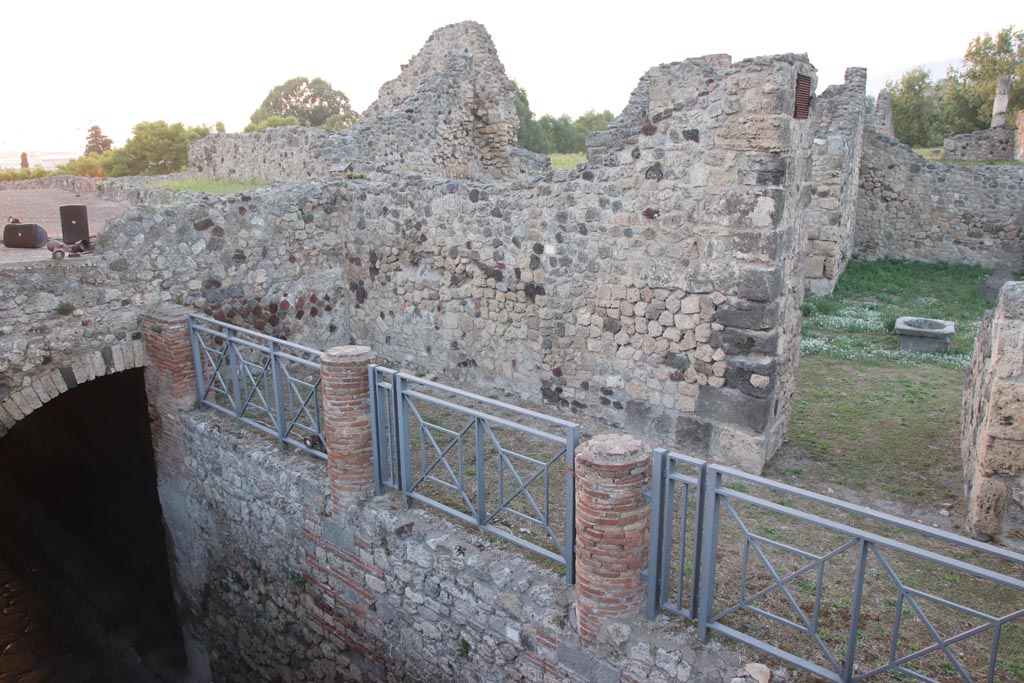 VII.16.1 Pompeii. October 2023. 
Looking north-west from Temple of Venus towards entrance doorway, on right. Photo courtesy of Klaus Heese.
