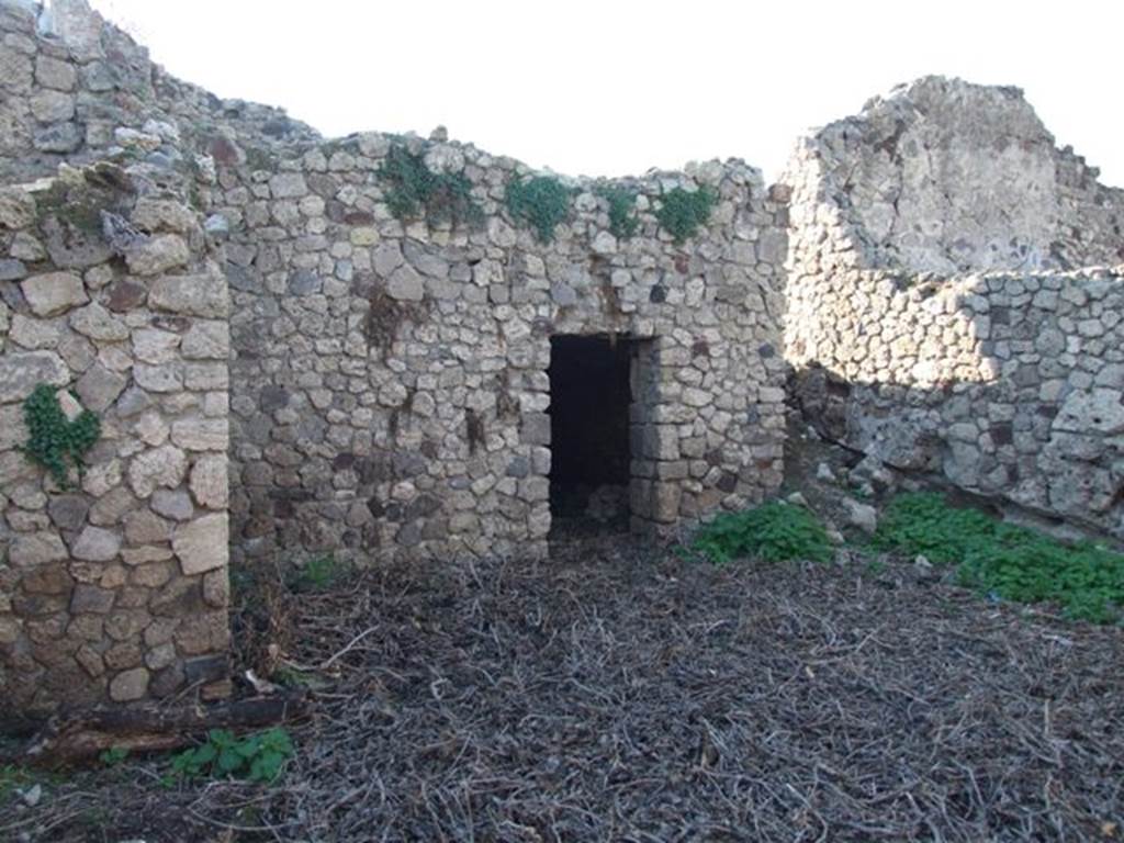 VII.16.1 Pompeii. December 2007. Courtyard in north-west corner and entrance to bath suite.