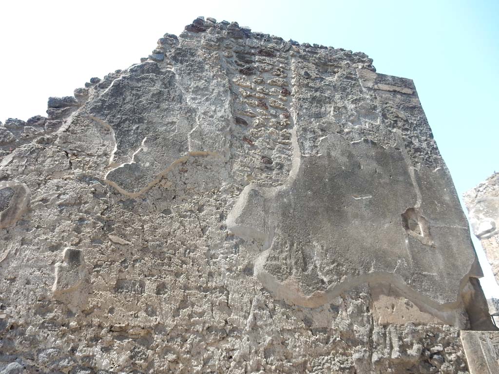 VII.16.13, Pompeii. June 2019. Front façade on south side of entrance doorway. Photo courtesy of Buzz Ferebee.