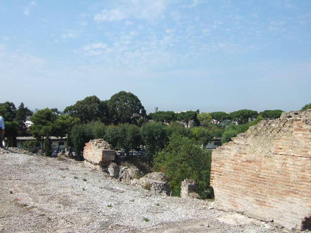 VII.16.15 Pompeii. September 2005. West end of north side of room 2, atrium.
There are no rooms at this level on this side only a vertical drop to rooms on the lower level.