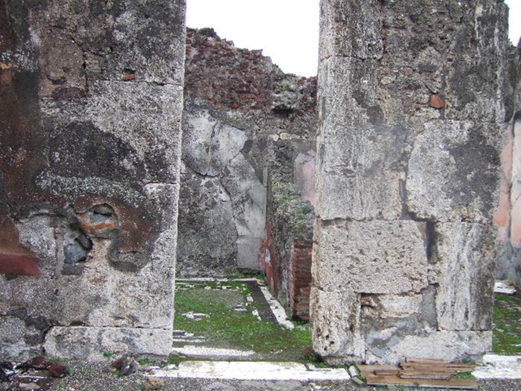 VIII.2.1 Pompeii. December 2005. Doorway to triclinium in north-east corner, on east side of atrium, before restoration. 