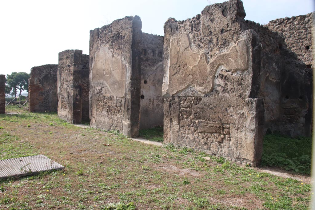 VIII.2.34 Pompeii. October 2023.
Looking south along west side of atrium, with doorway to room ‘o’ on left, followed by west ala ‘i’, and doorways to ‘k’, ‘l (L)’ , and ‘q’, on right.
Photo courtesy of Klaus Heese.