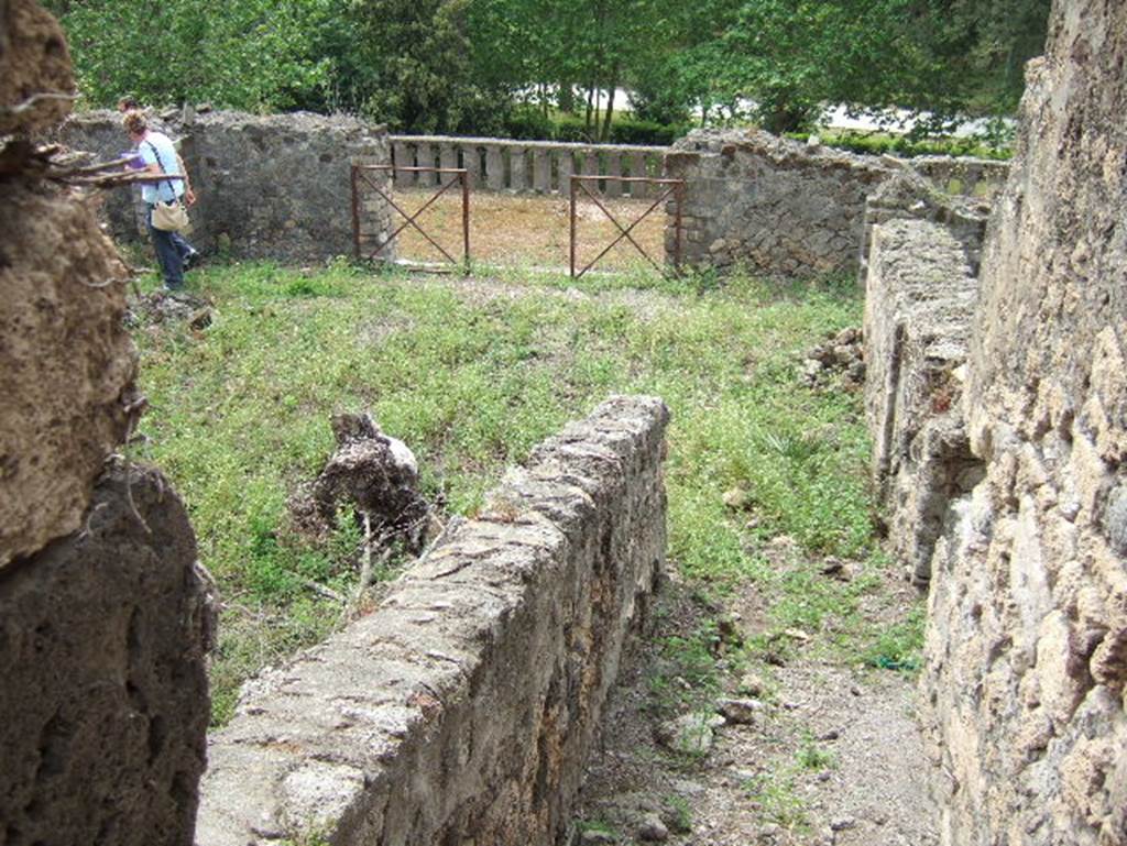 VIII.2.34 Pompeii. May 2006. Looking south across ramp or steps of passagway ‘7’ towards site of three triclinia, leading onto the lower terrace.