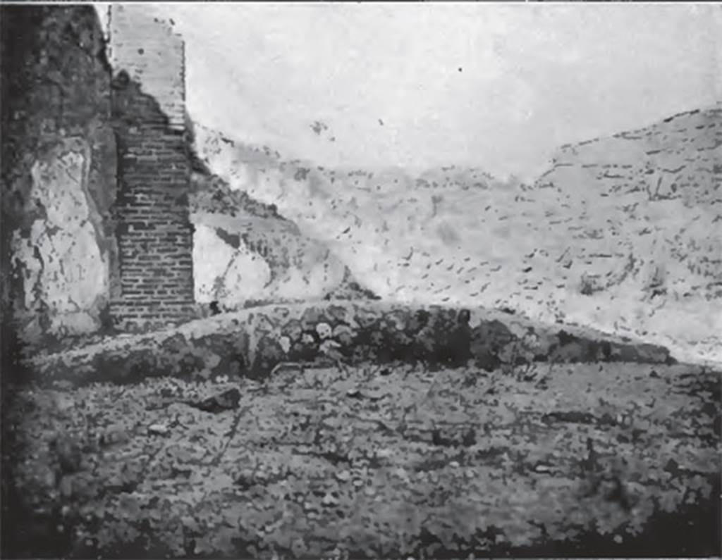 VIII.3.15 Pompeii. About 1906. Garden east side. Curved stibadium or sigma, a semi-circular dining couch.
According to Jashemski �
This unusual building, according to Fiorelli, although originally part of the house at VIII.3.14, had been converted into a caupona.
The garden, which made up a large part of the building, had a portico on the west and south, supported on the south by two square pillars, which were painted with vines. A low wall, which had an entrance on the west, enclosed the garden on the west and south.
In the east part of the garden was a masonry stibadium (3.50m in its widest dimension), the only one found thus far at Pompeii.
It was perhaps shaded by a pergola. The table was supported by a monopodium.
Jashemski sources �
Mazois,2;60 and pl.12,1 (plan);
Niccolini, Case, vol.2, �Descr.Gen�, p.66;
Breton, p.497-8 and drawing of stibadium on p. 498;
Dyer, p.316;
Fiorelli, �Descr�, p. 326-7;
Thedenat, p.90, and fig.46, on p.90;
Soprano, p.306-7, no. 28, and fig.28 on p.291.
See Jashemski, W. F., 1993. The Gardens of Pompeii, Volume II: Appendices. New York: Caratzas. (p.211).

According to Soprano �
Ubicazione: giardino. Diametro massimo, m.3.40.
Bibliog. Bonucci, op. c, p. 159; Breton, op. c, p. 337; Mazois II, p.50, tav.xii, fig. 1 e 2;
Thedenat, op. c. p. 84, and fig.50;
Fiorelli, op. c, p. 237;
Dyer, op. c, p. 315.
Era l�unica stibadium rinvenuto, finora, a Pompei. 
Si trova nella parte orientale di una piccola area di giardino circondata da podio lungo i lati di nord e di ovest, ed era completamente privo di intonaco. 
Delle due semicirconferenze che delimitano questo stibadium, quella interna era regolare; quella esterna era grossolanamente ricurva.
La mensa, con monopodio, di cui fa cenno il Dyer, non e piu in situ.
See Soprano, P. (1950). I triclini all�aperto di Pompei. (In Pompeiana, raccolta di studi per il secondo centenario degli scavi di Pompei. Napoli, Gaetano Macchiaroli, Editore, P. 306-7, no.28).
