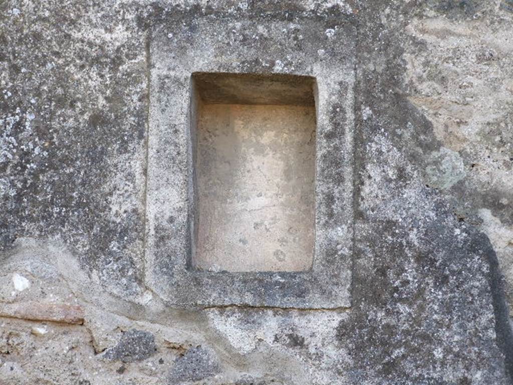 VIII.4.5 Pompeii. December 2006. Niche in south wall of shop. Boyce described this niche as a small rectangular niche adorned with an aedicula fa�ade. 
See Boyce G. K., 1937. Corpus of the Lararia of Pompeii. Rome: MAAR 14. (p.76) 
