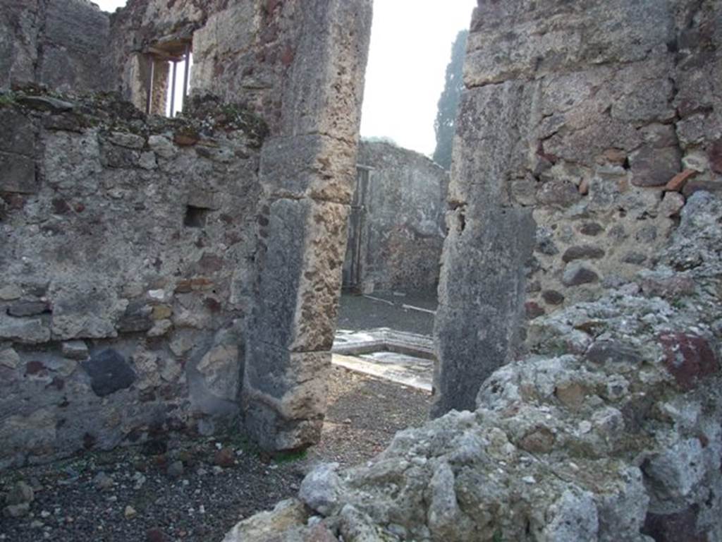 VIII.4.15 Pompeii. December 2007. Looking into atrium from room 2 in north-east corner of atrium, taken from VIII.4.16.

