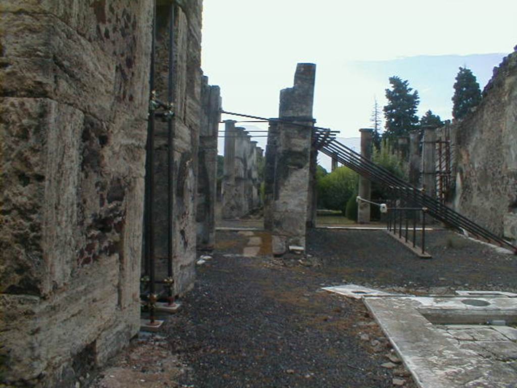 VIII.4.15 Pompeii. September 2004. East side of atrium, looking south.