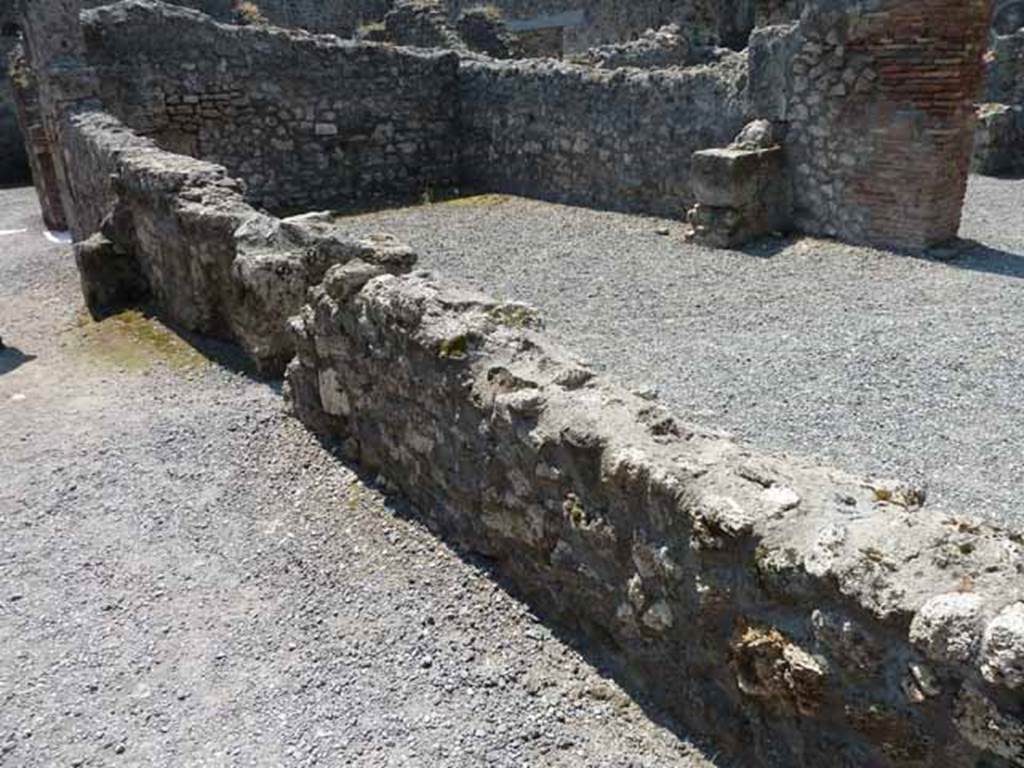 VIII.5.24 Pompeii. May 2010. Entrance corridor, remains of west wall, looking over wall with VII.5.23.