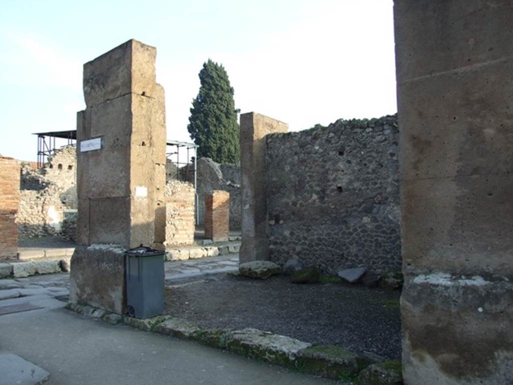 VIII.5.30 Pompeii. December 2007.  Looking south-east from Via dell� Abbondanza towards entrance VIII.5.31 on Via dei Teatri. On the pilaster on the right, between VIII.5.30 and 29, a graffito was found. (See VIII.5.29)
