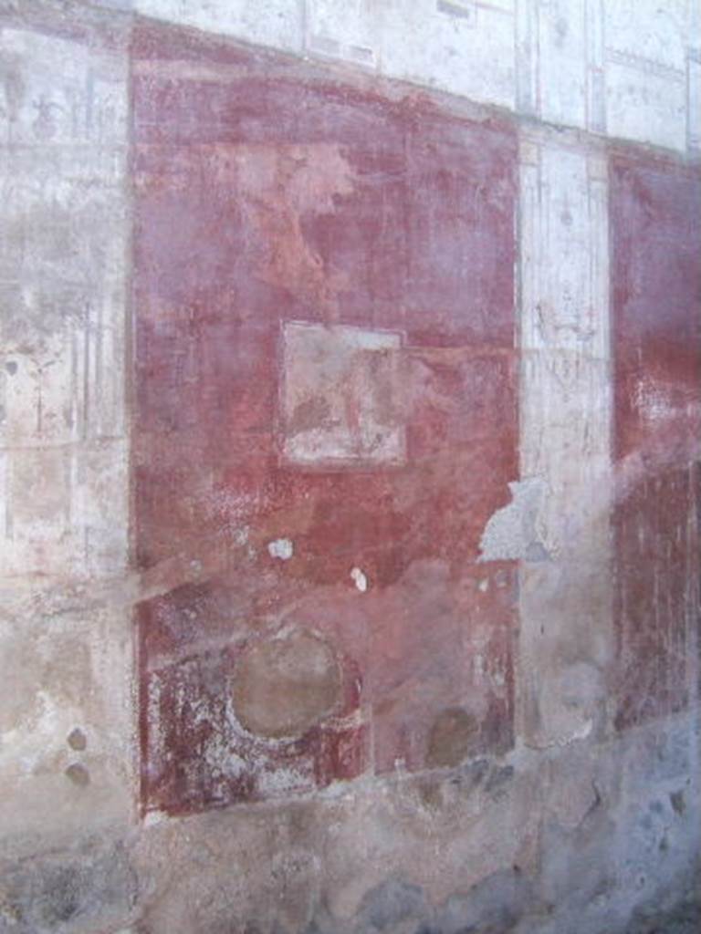 VIII.5.37 Pompeii. September 2005. Room 13, oecus.Painted panel in centre of south wall.