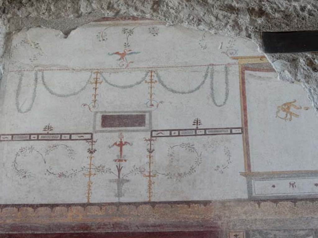 VIII.5.37 Pompeii. May 2017. Room 13, detail of painted decoration from upper west wall in south-west corner after restoration. Photo courtesy of Buzz Ferebee.
