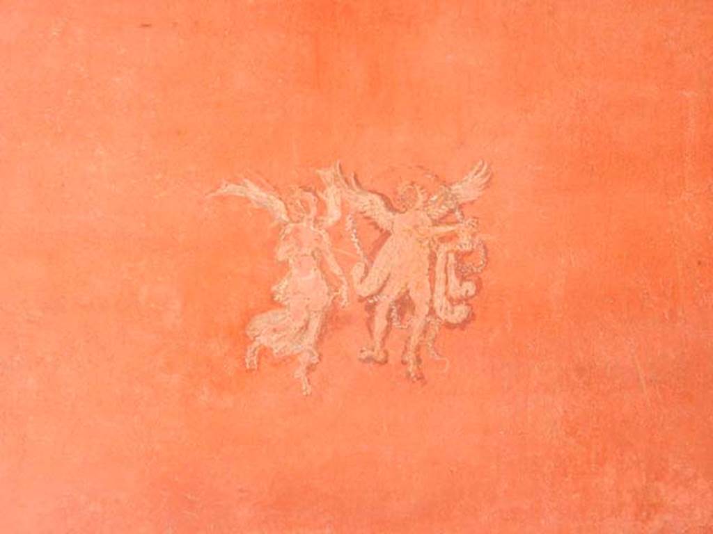 VIII.5.37 Pompeii. May 2017. Room 14, painted floating figures after restoration, on east wall at south end.Photo courtesy of Buzz Ferebee.