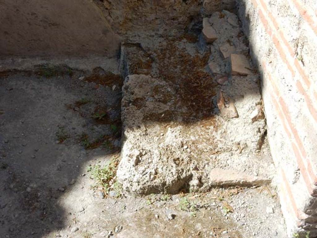 VIII.5.37 Pompeii. May 2017. Room 15, looking north to base of stairs in north-east corner of kitchen. Photo courtesy of Buzz Ferebee.