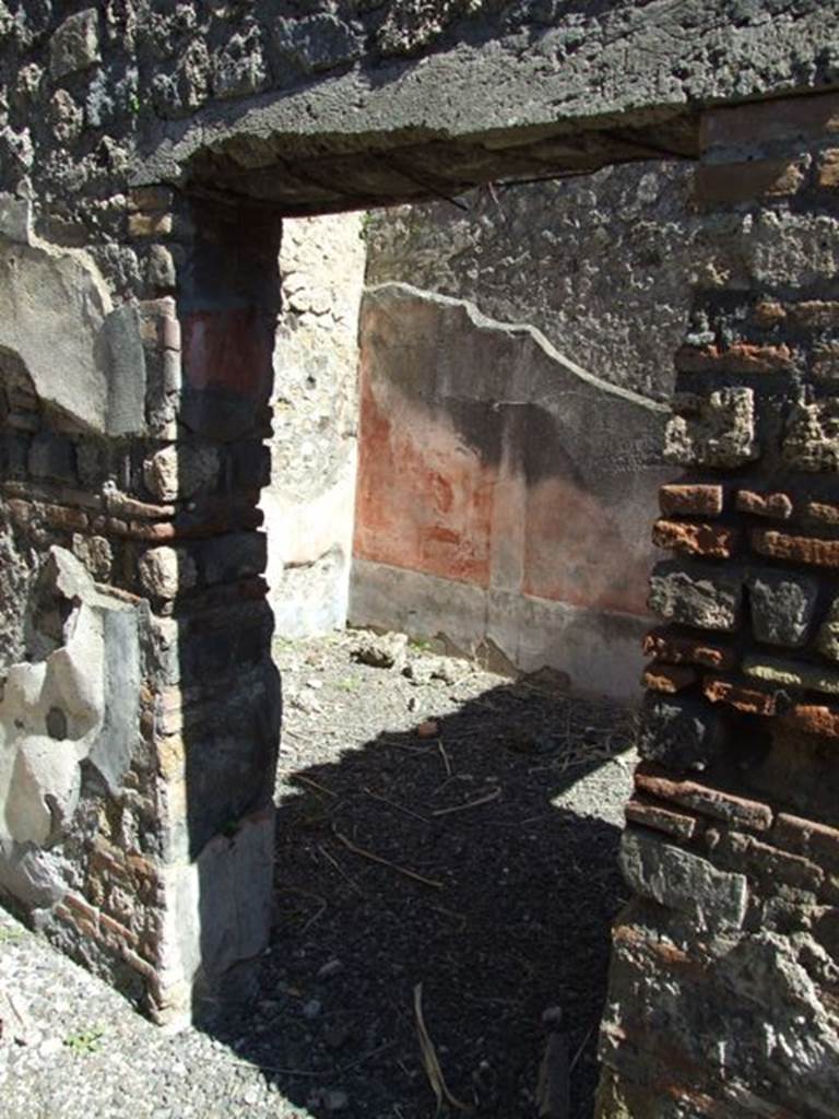 VIII.5.39 Pompeii. March 2009. Doorway to Room 8, in East wall of Room 7.
