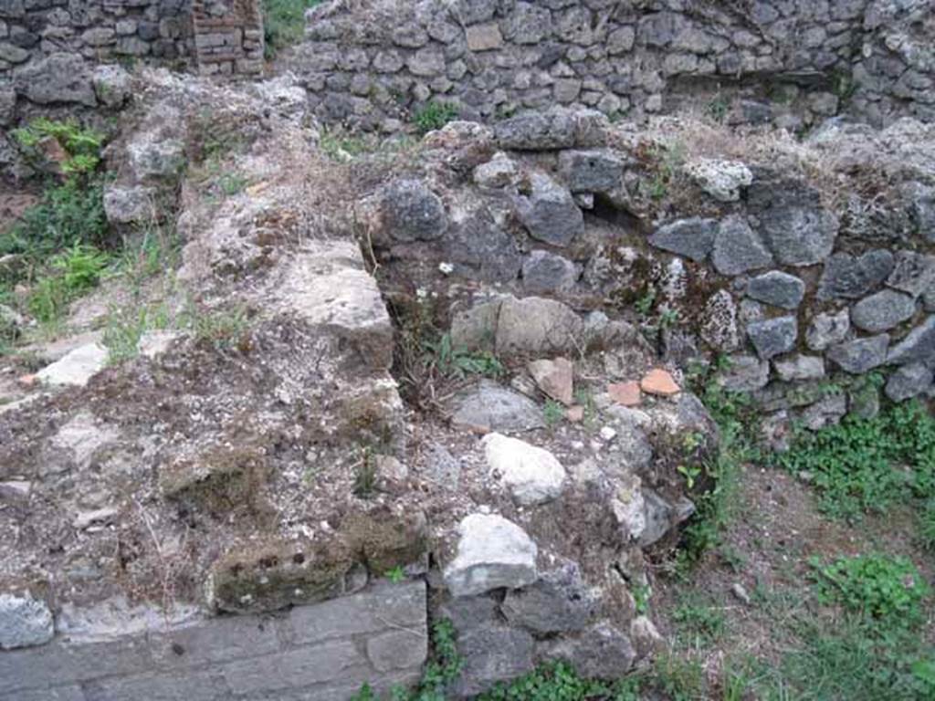 VIII.7.12 Pompeii. September 2010. Looking south at the west side of the kitchen area. Photo courtesy of Drew Baker.
