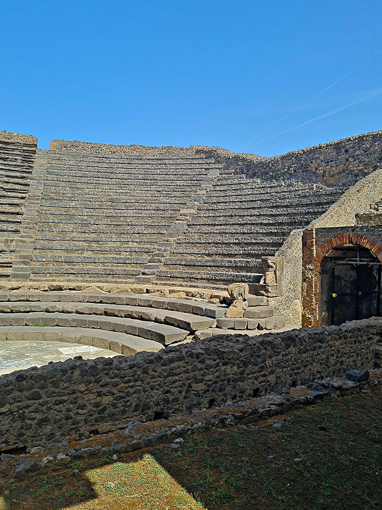 VIII.7.19/18 Pompeii. September 2024. 
Looking towards seating on east side, from stage. Photo courtesy of Giuseppe Ciaramella.
