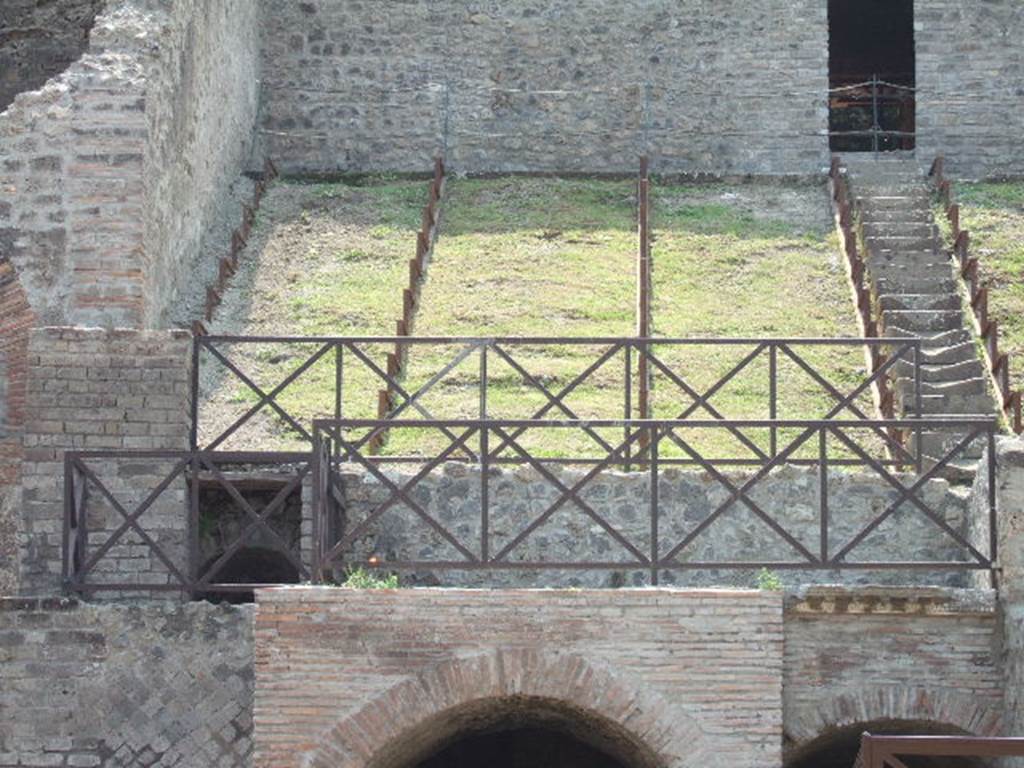 VIII.7.20 Pompeii. May 2006. Tribunal and seats on the west side.