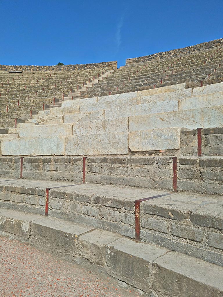 VIII.7.20 Pompeii. September 2024. Detail of seating. Photo courtesy of Giuseppe Ciaramella.

