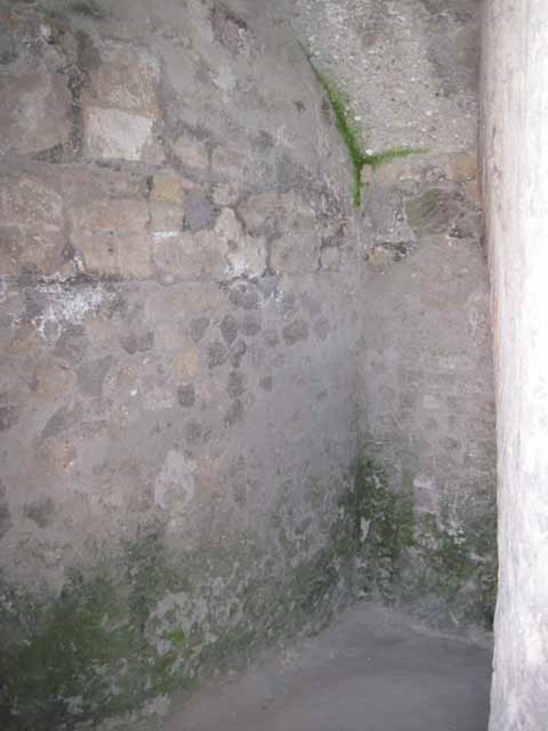 VIII.7.21 Pompeii. September 2010. At the entrance to the latrine in the archway of the theatre, the entrance switches back right of image under stairs to summa cavea. Photo courtesy of Drew Baker.