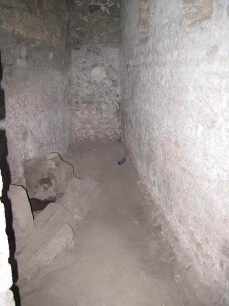 VIII.7.21 Pompeii. September 2010. Windows from the latrine out into the triangular forum on west wall. Looking south towards quadriporticus. Photo courtesy of Drew Baker.