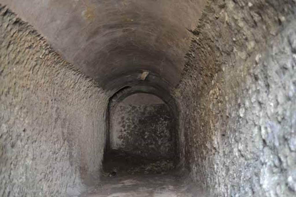 VIII.7.22/23/24 Pompeii. October 2010. Looking towards west end of vaulted room E. Photo and information courtesy of Drew Baker/Gareth Beale/Hembo Pagi.