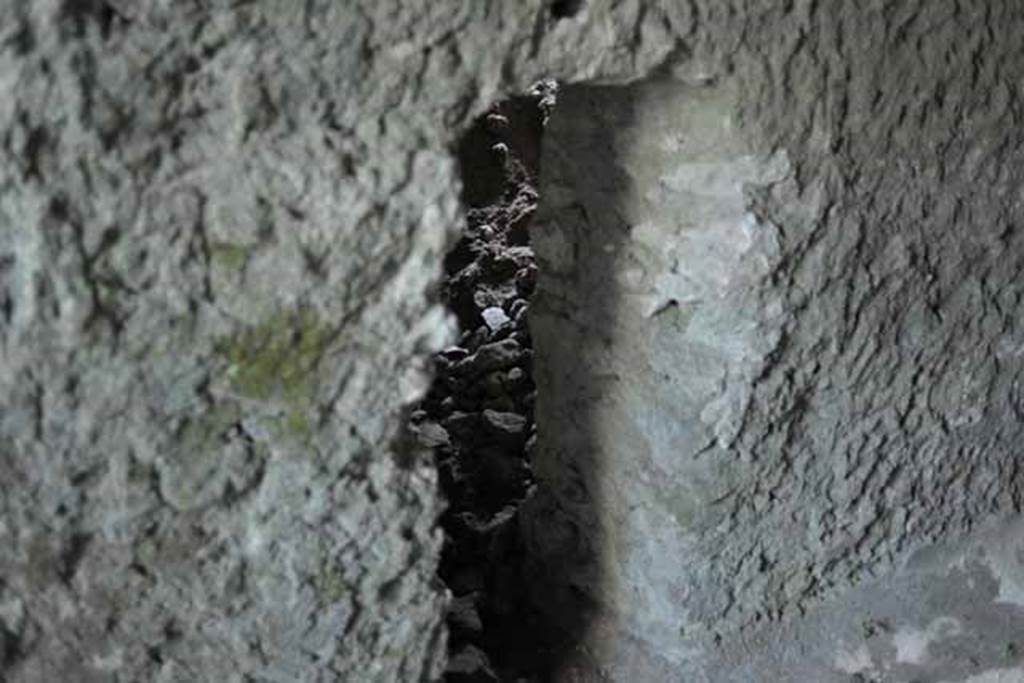 VIII.7.22/23/24 Pompeii. October 2010. Doorway to room F in south wall of room E. Photo and information courtesy of Drew Baker/Gareth Beale/Hembo Pagi.
