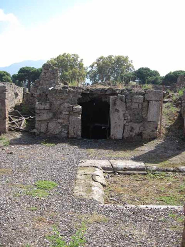 VIII.7.24 Pompeii. September 2010. Looking south from doorway to first room on right, across atrium. Photo courtesy of Drew Baker.
