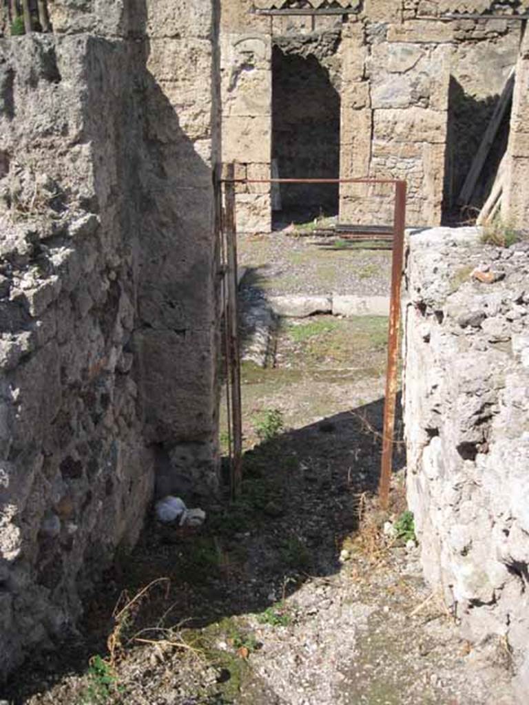 VIII.7.24 Pompeii. September 2010. Looking north from top of stairs,  looking down into atrium. Photo courtesy of Drew Baker.
