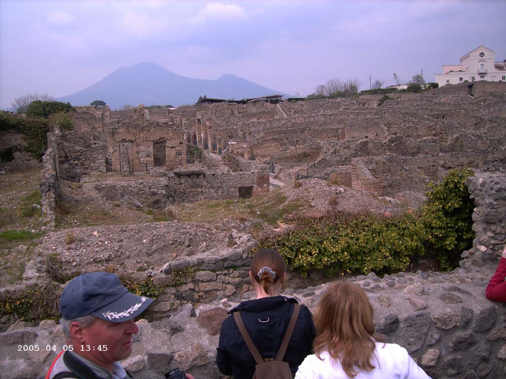 VIII.7.24 Pompeii. April 2005. Looking north across upper peristyle area, from VIII.7.21 ramp and steps to upper levels of Theatre.
Photo courtesy of Klaus Heese.