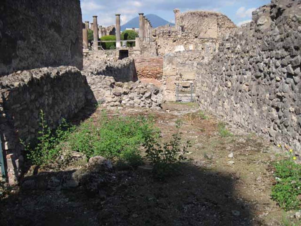 VIII.7.26 Pompeii. September 2010. Looking north across room behind main entrance room, towards Via del Tempio d�Iside. Entrance 27A on left of image, enters from the alleyway leading from the theatre. Photo courtesy of Drew Baker.
