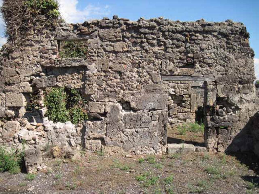 VIII.7.26 Pompeii. September 2010. Eastern wall, on right hand side, of atrium. Photo courtesy of Drew Baker.